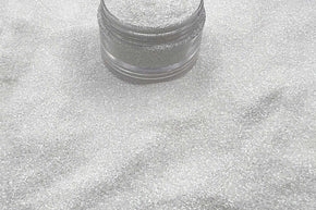 A white glitter with a shimmer not a sparkle