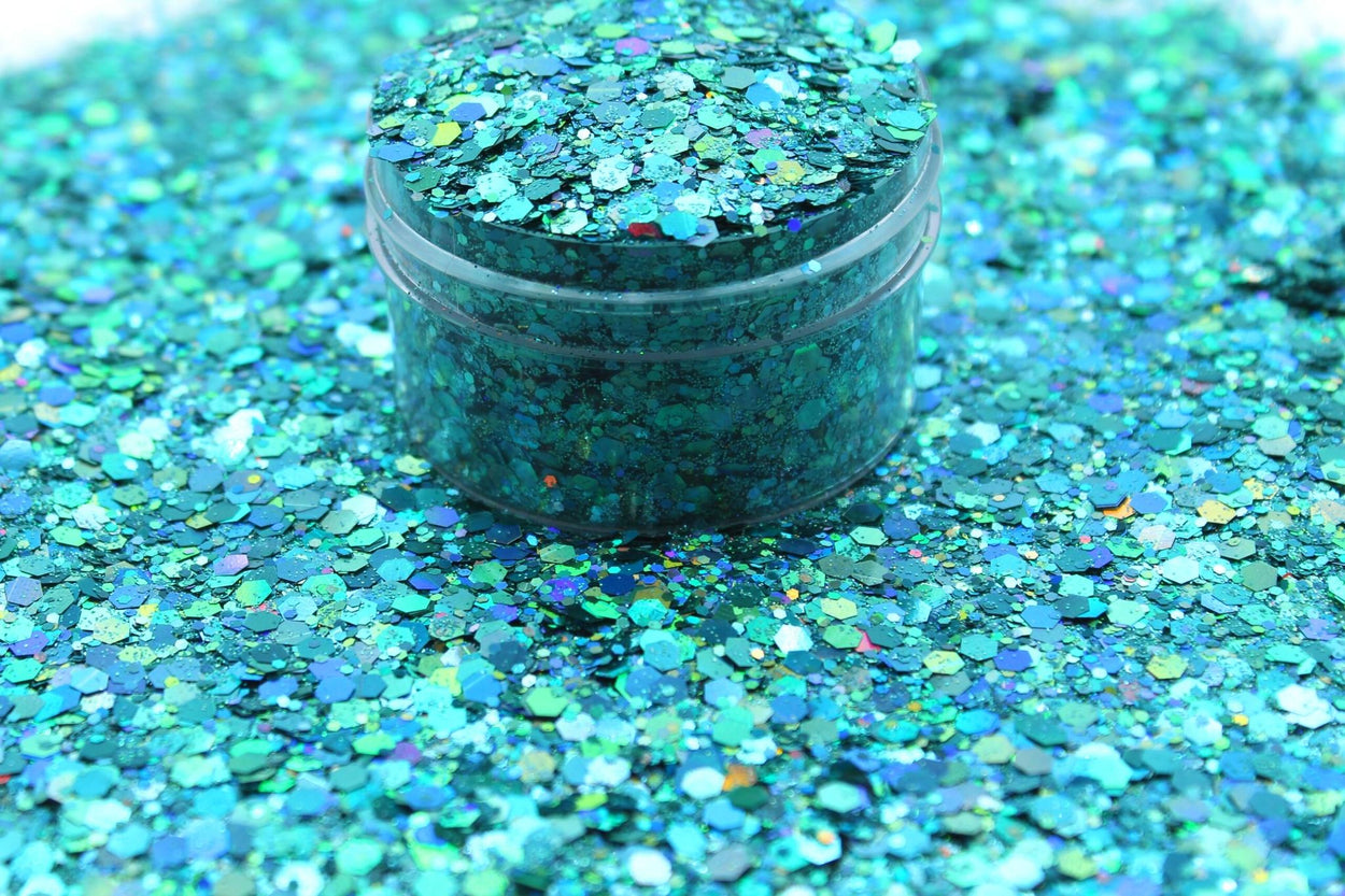 Dragon’s Gem  is a blue/teal chunky holographic glitter