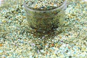 Kaleidoscope is a gold with holographic 4 point stars glitter